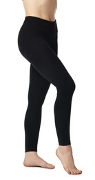 Photo of Woman wearing black sports leggings on white background, closeup