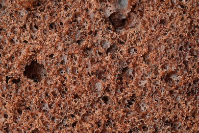 Photo of Tasty chocolate sponge cake as background, closeup