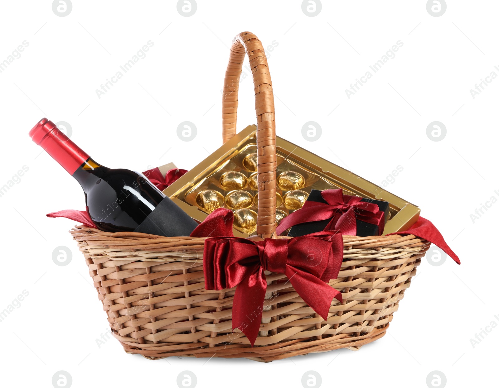 Photo of Wicker gift basket with wine isolated on white