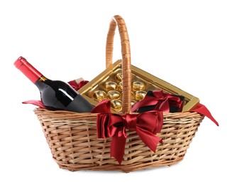 Photo of Wicker gift basket with wine isolated on white