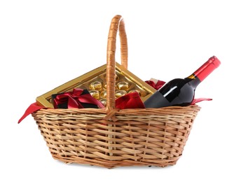 Photo of Wicker gift basket with wine isolated on white