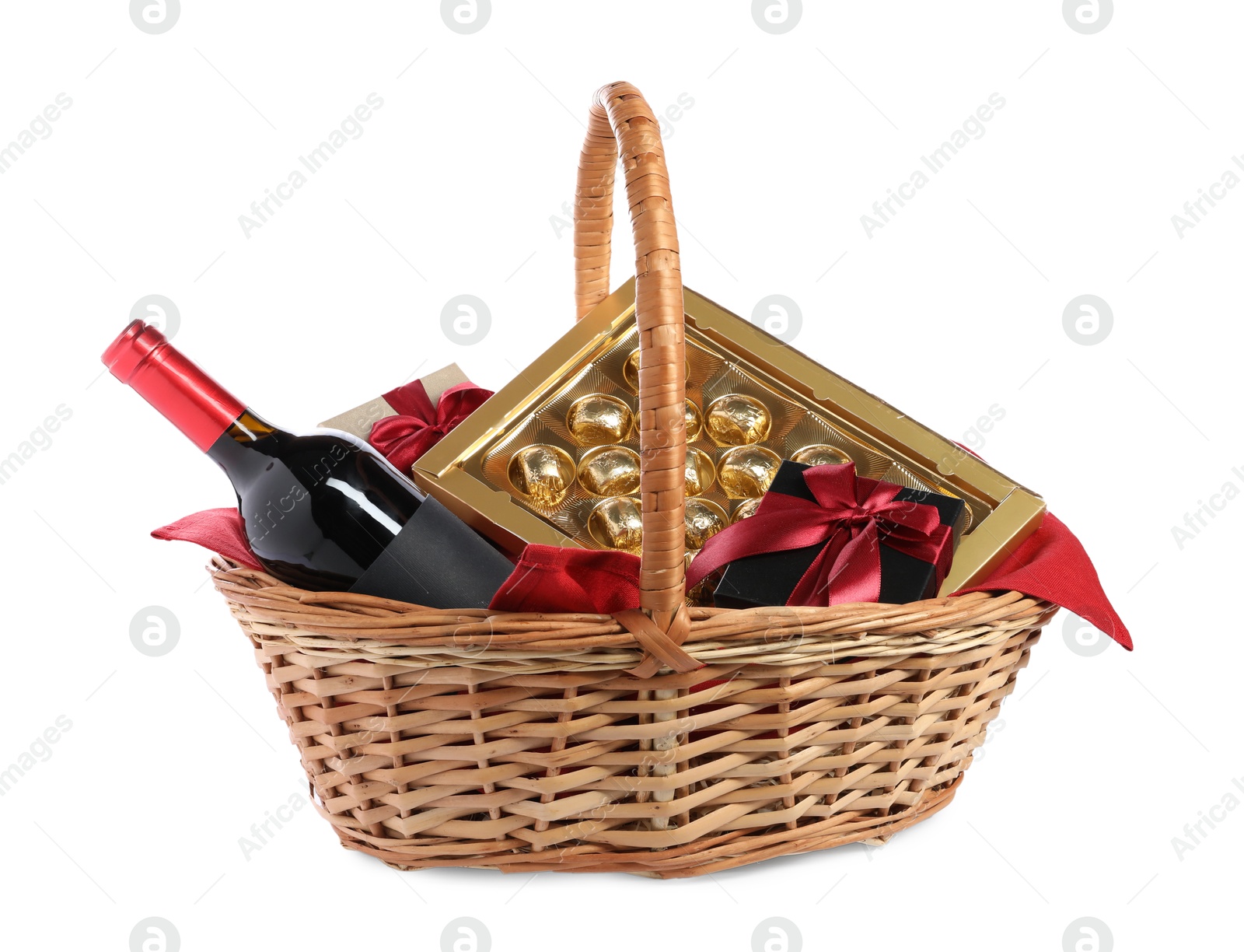 Photo of Wicker gift basket with wine isolated on white