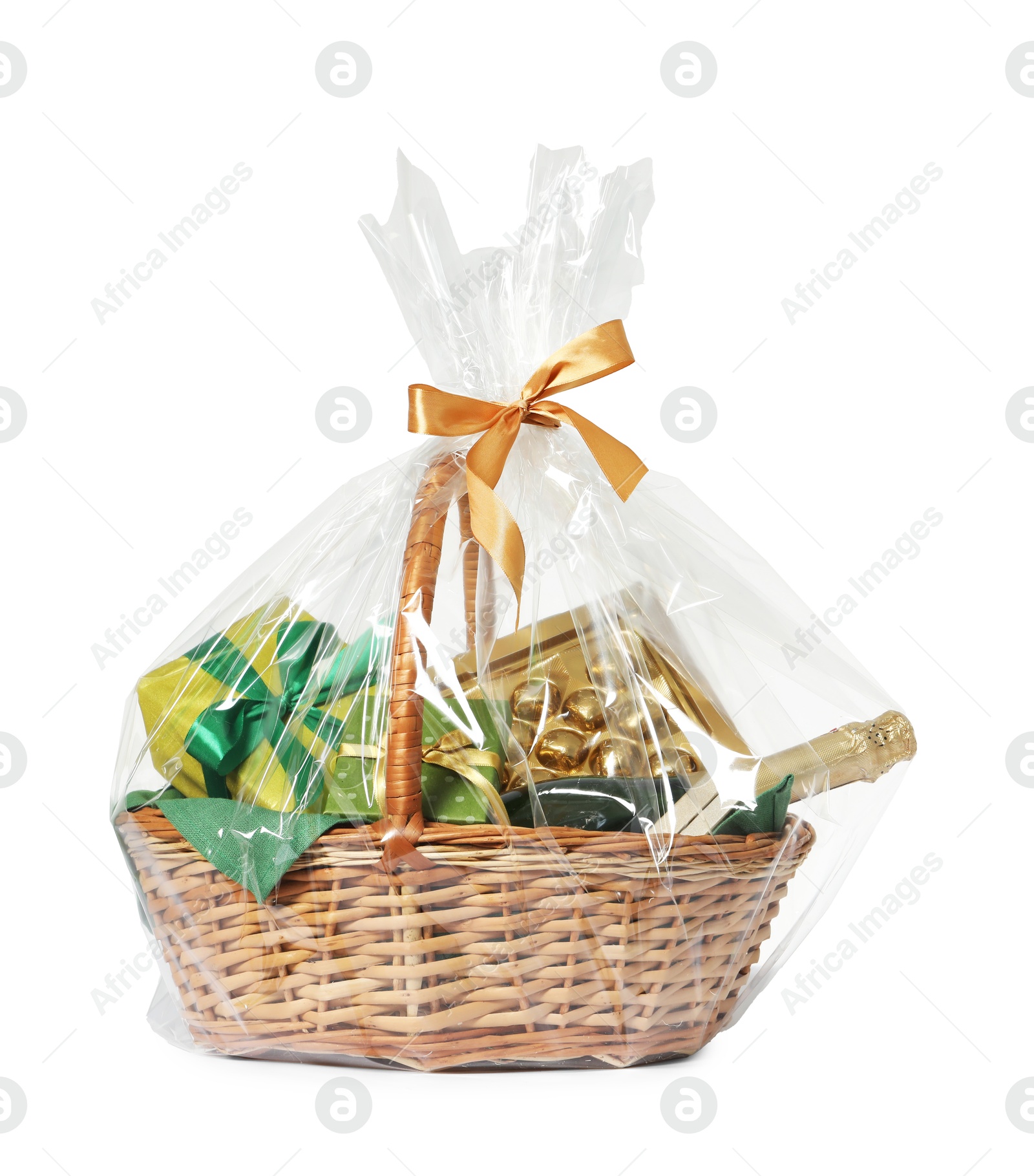 Photo of Wicker gift basket with sparkling wine isolated on white