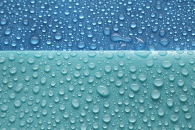 Photo of Water drops on color background, above view