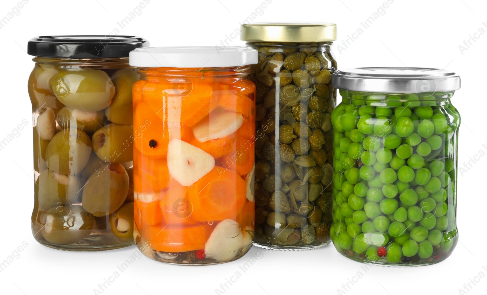 Photo of Different pickled products in jars isolated on white