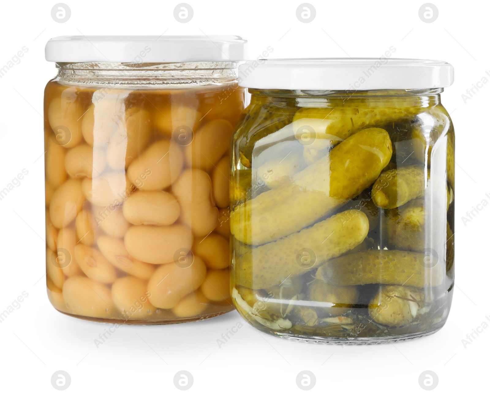 Photo of Different pickled products in jars isolated on white