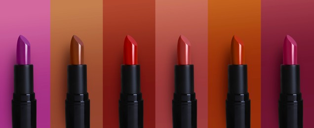 Set with beautiful lipsticks on different color backgrounds. Banner design