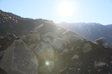 Photo of Picturesque view of stones in mountains on sunny day