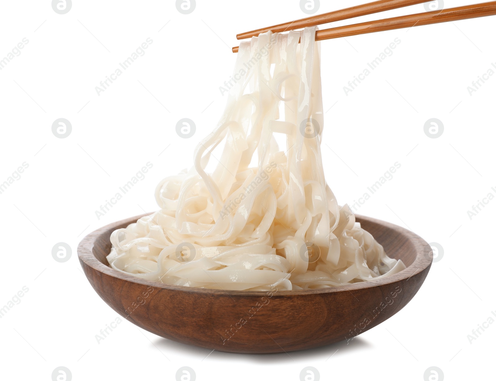 Photo of Taking rice noodles with chopsticks from bowl on white background