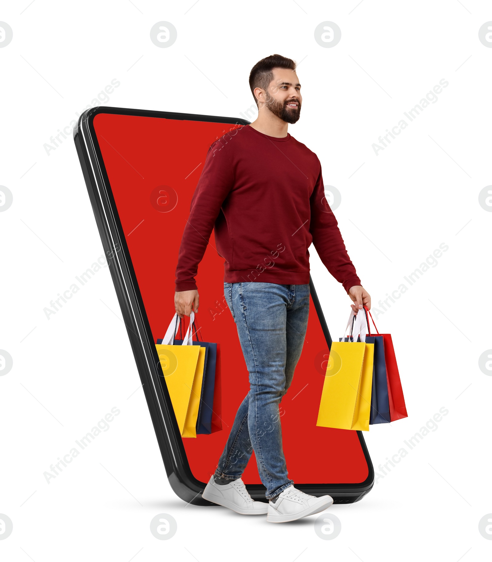 Image of Online shopping. Man with paper bags walking out from smartphone on white background