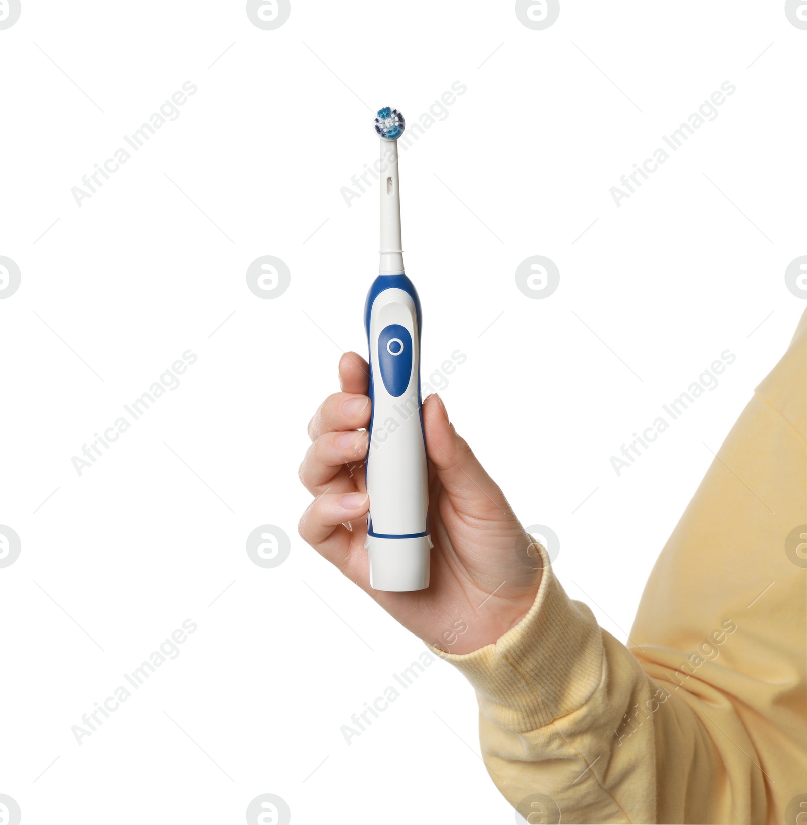 Photo of Woman holding electric toothbrush on white background, closeup