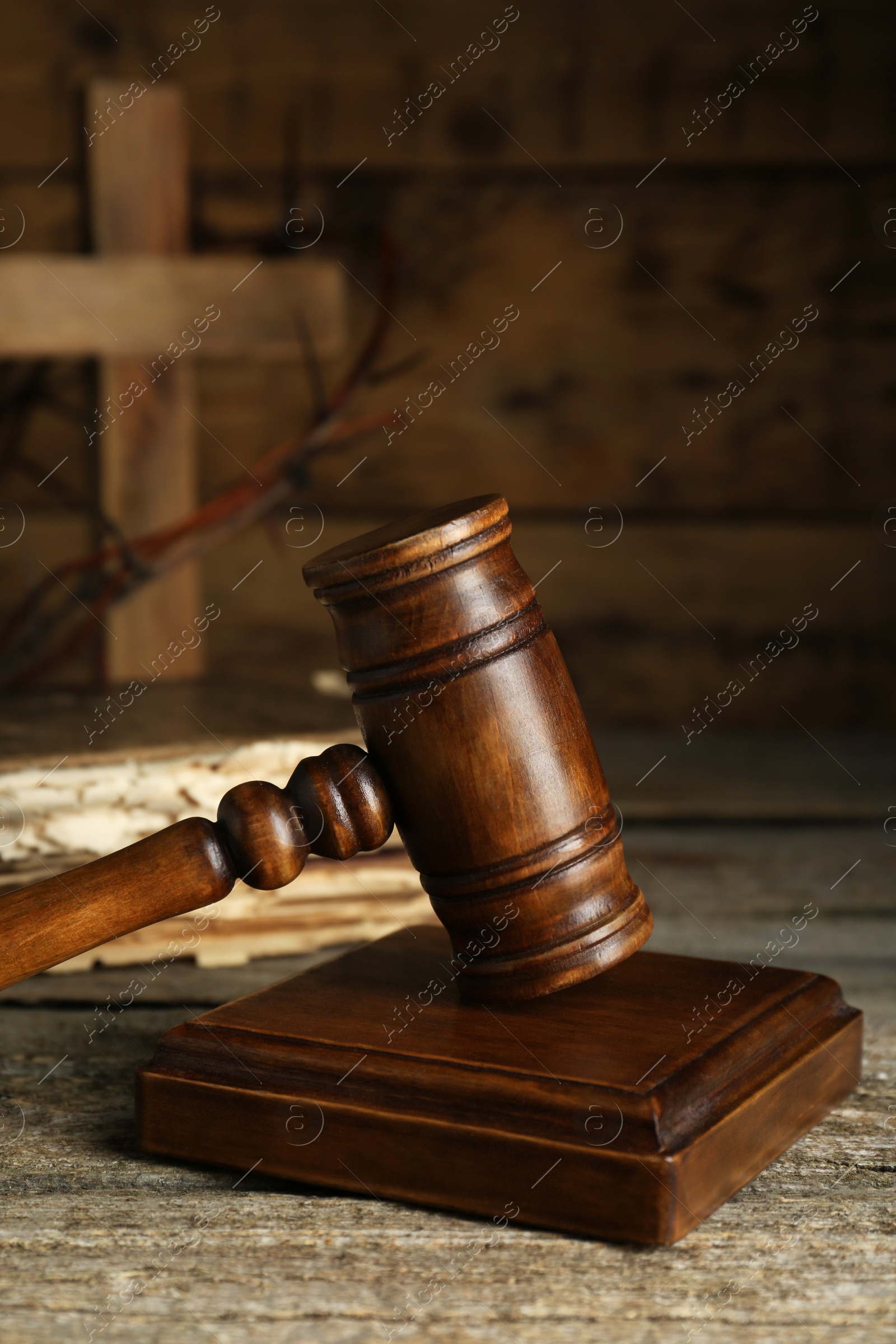 Photo of Judge gavel on old wooden table. Biblical concept