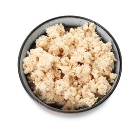 Photo of Bowl of tasty prepared horseradish isolated on white, top view