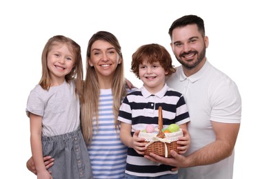 Photo of Easter celebration. Happy family with wicker basket full of painted eggs isolated on white