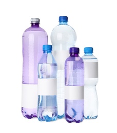 Bottles of pure water with blank labels on white background