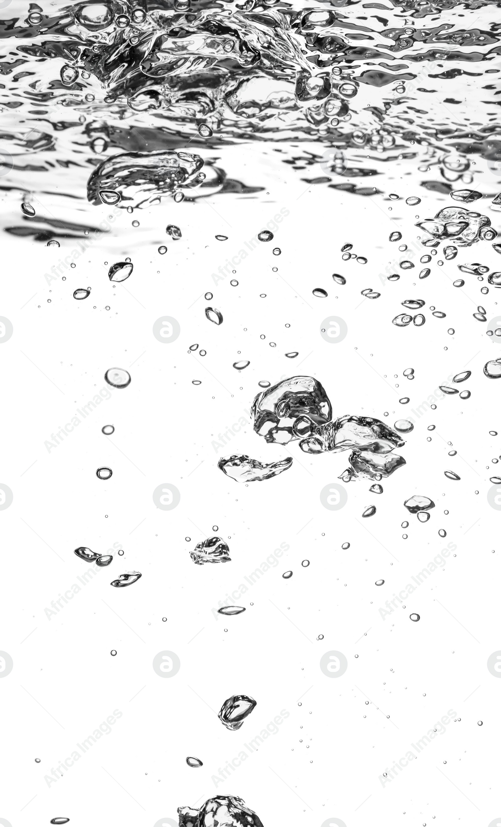 Photo of Air bubbles in water on white background