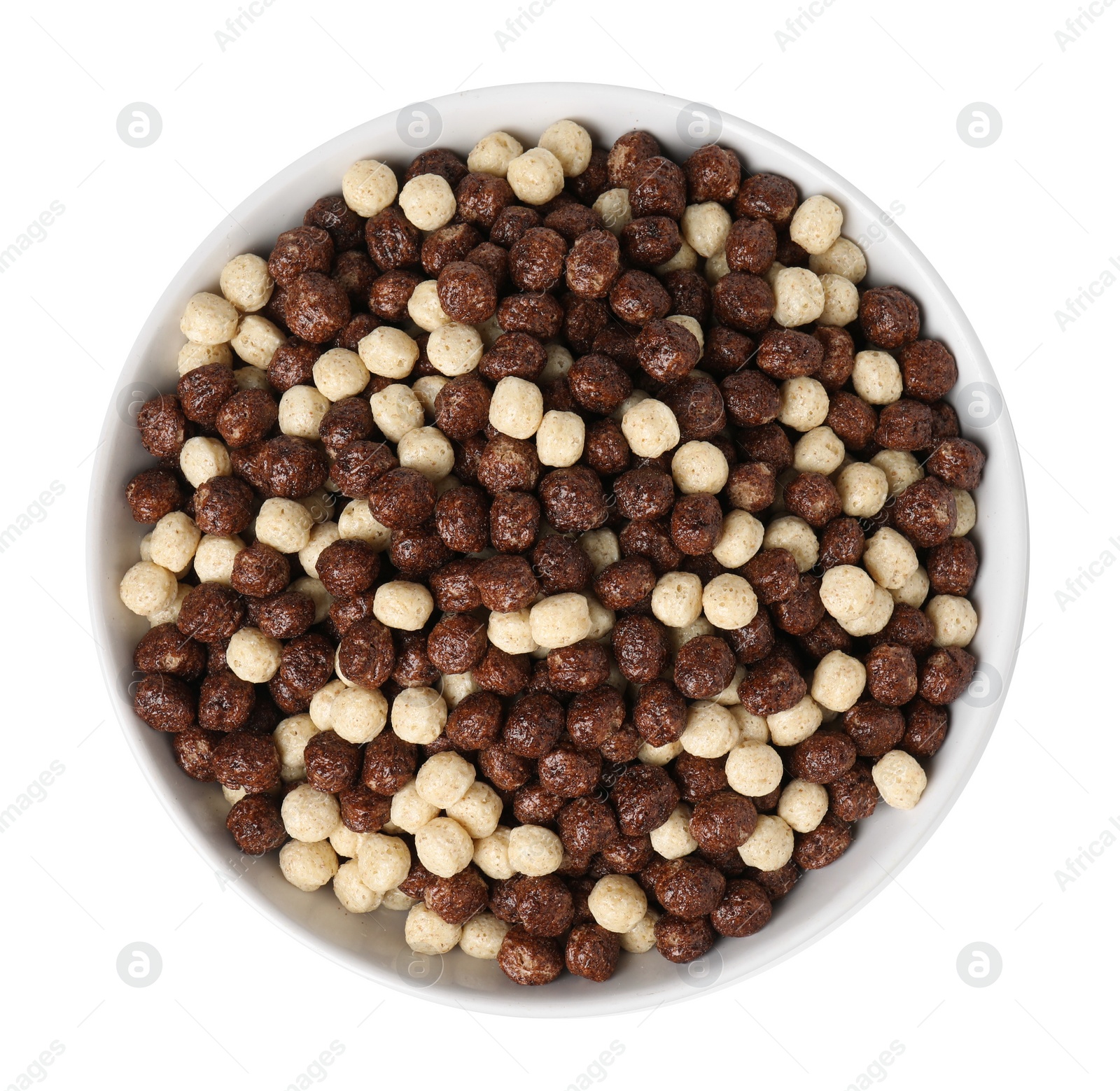 Photo of Tasty cereal balls in bowl isolated on white, top view