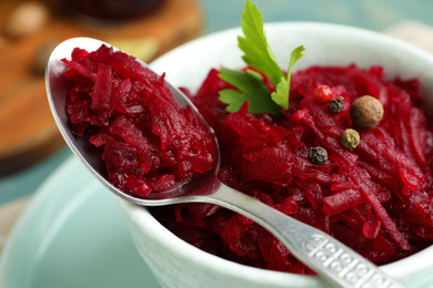 Delicious pickled beets in bowl, closeup view