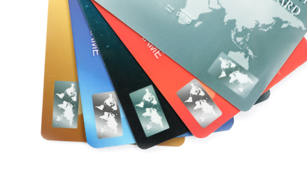 Photo of Different credit cards on white background, closeup