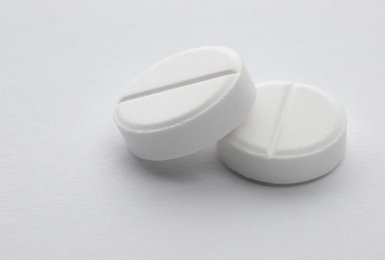 Pills on white background. Medical treatment