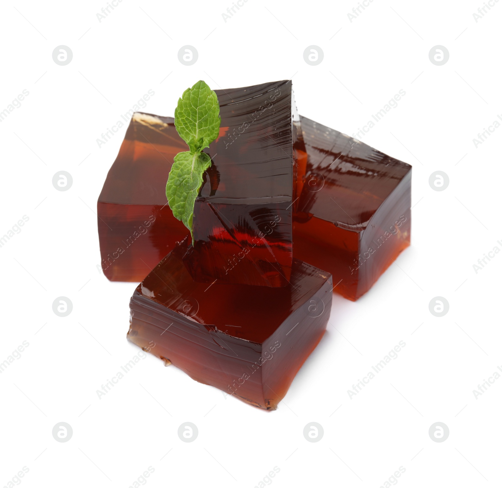 Photo of Delicious grass jelly cubes with mint on white background