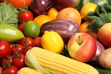 Assortment of fresh organic fruits and vegetables as background, closeup