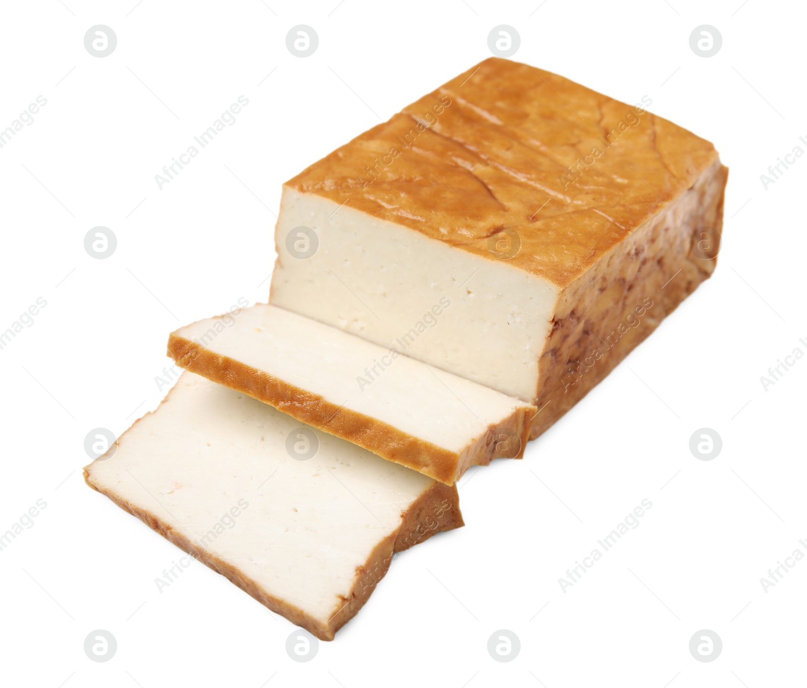 Photo of CUt smoked tofu cheese isolated on white