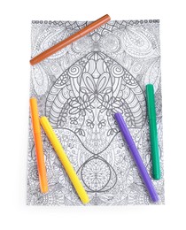 Antistress coloring page and felt tip pens on white background, top view