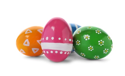 Photo of Decorated Easter eggs on white background. Festive tradition