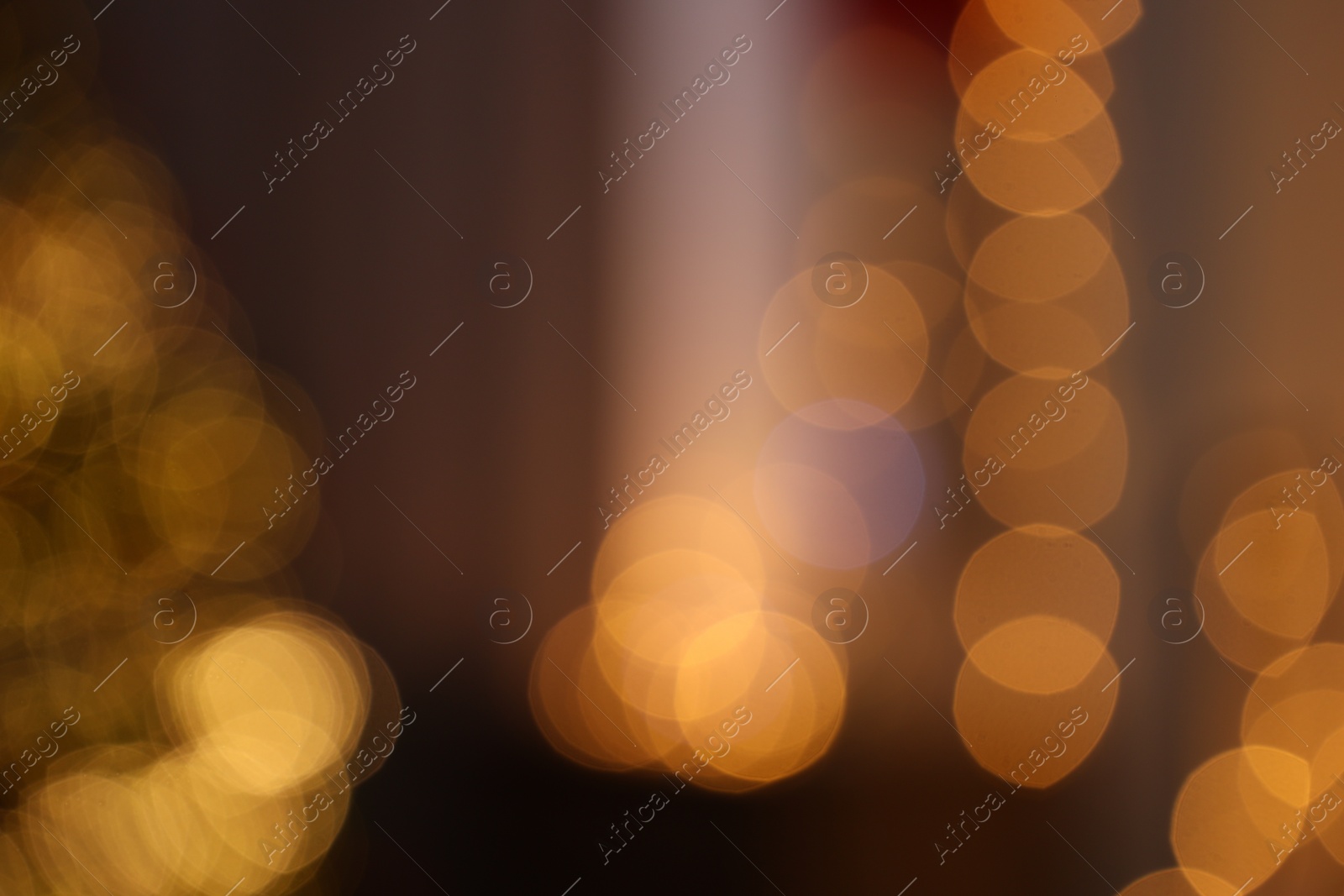 Photo of Blurred view of beautiful Christmas lights. Bokeh effect