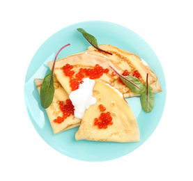 Photo of Delicious pancakes with caviar and cream isolated on white, top view