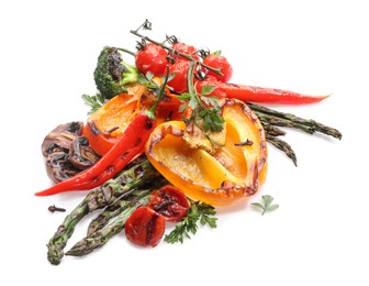 Photo of Different delicious grilled vegetables isolated on white