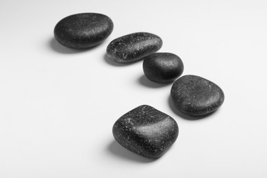 Photo of Group of different stones on white background