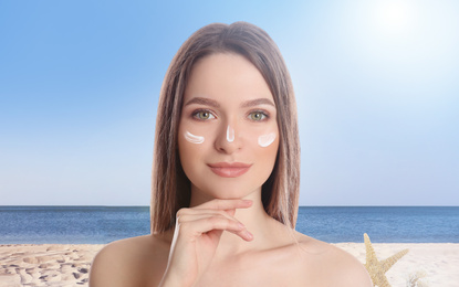 Image of Young woman with sun protection cream at beach