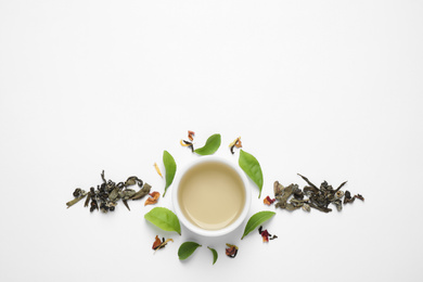 Flat lay composition with green tea on white background