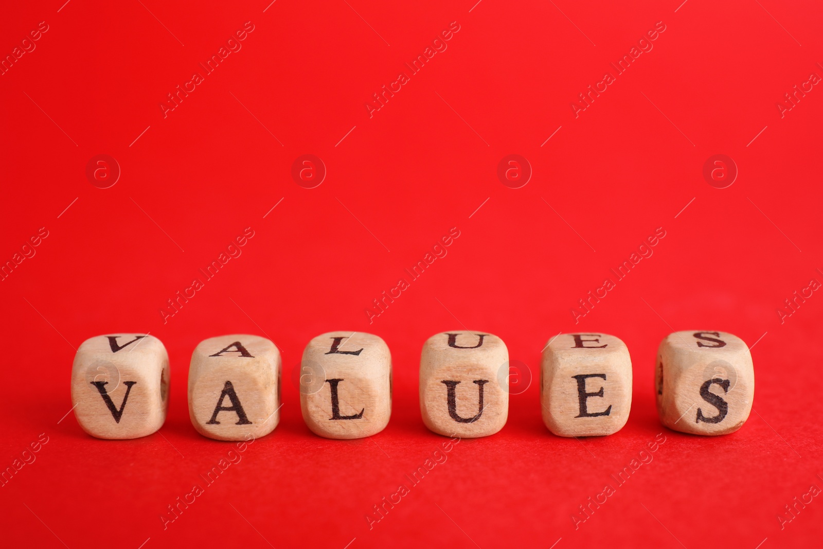 Photo of Beads with word VALUES on red background