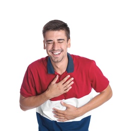 Photo of Portrait of handsome young man laughing on white background