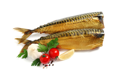 Photo of Tasty smoked fish with vegetables and lemon on white background