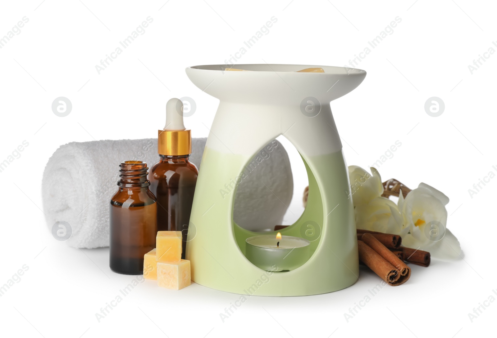 Photo of Composition with aroma lamp on white background