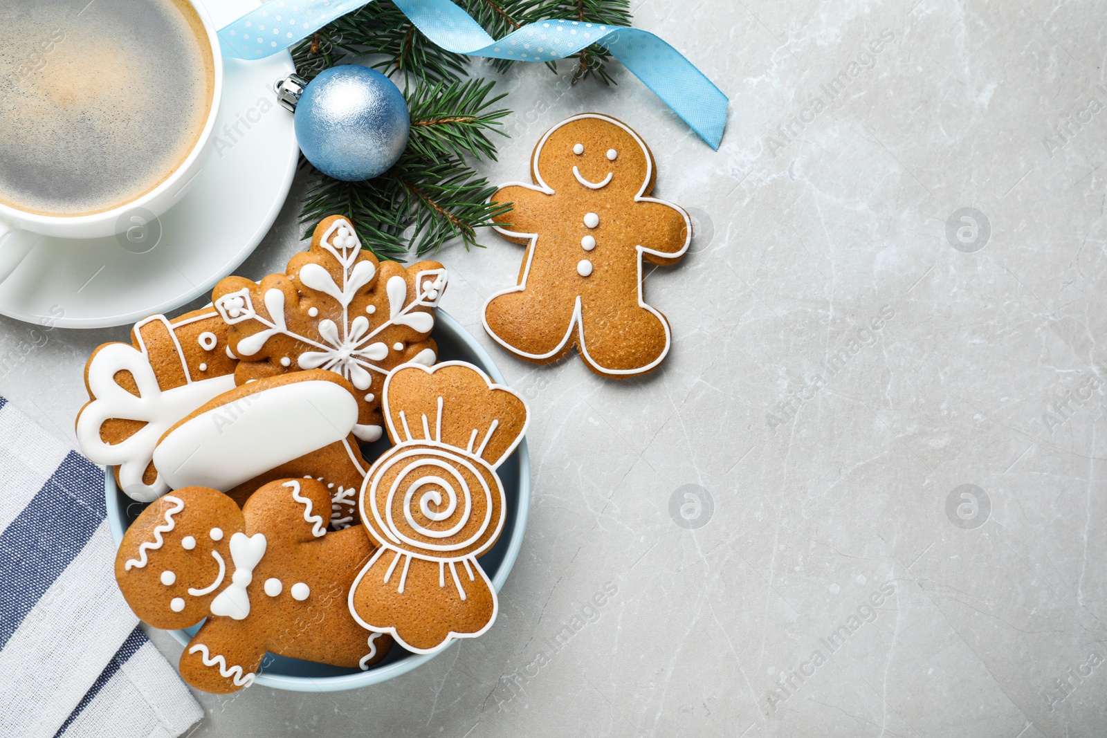 Photo of Delicious Christmas cookies on light table, flat lay. Space for text