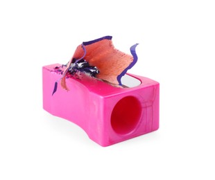 Photo of Pink sharpener with pencil shavings on white background