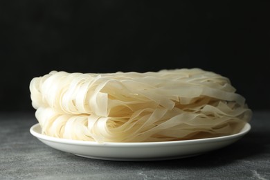 Photo of Block of rice noodles on grey table