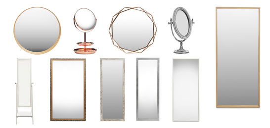 Set of different stylish mirrors on white background