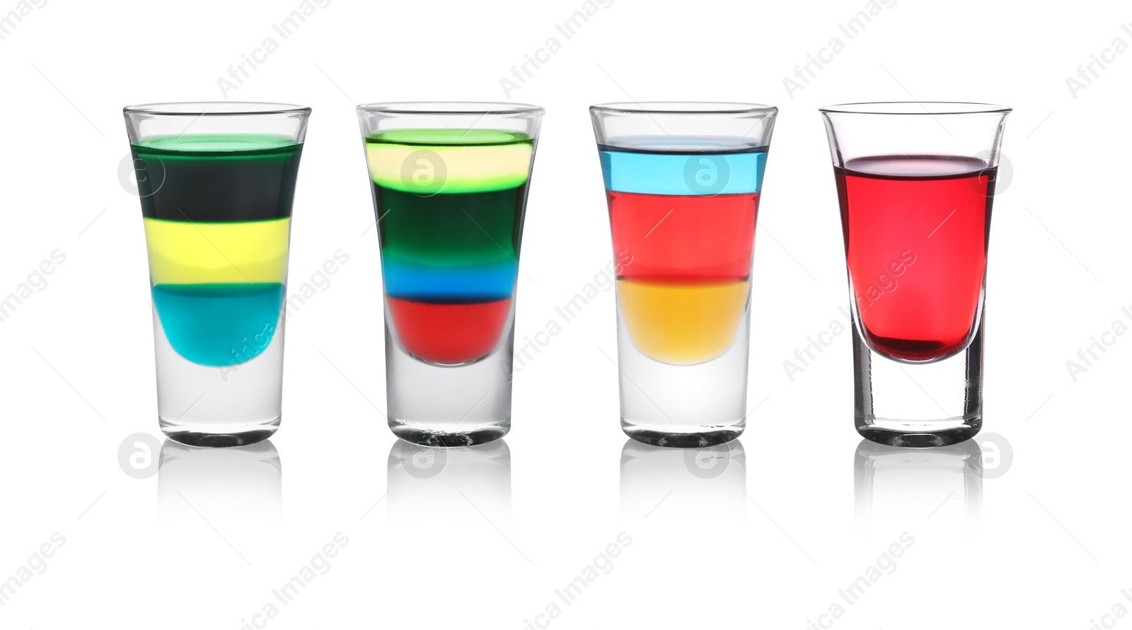 Image of Different shooters in shot glasses isolated on white, set