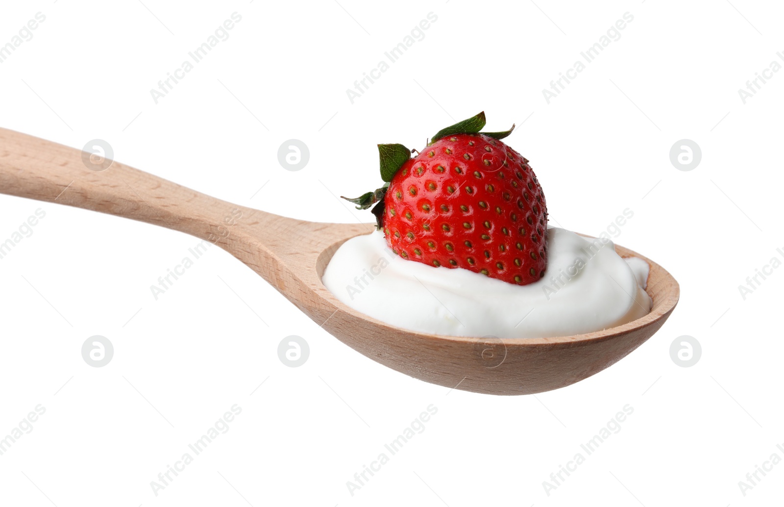 Photo of Wooden spoon with yogurt and strawberry isolated on white