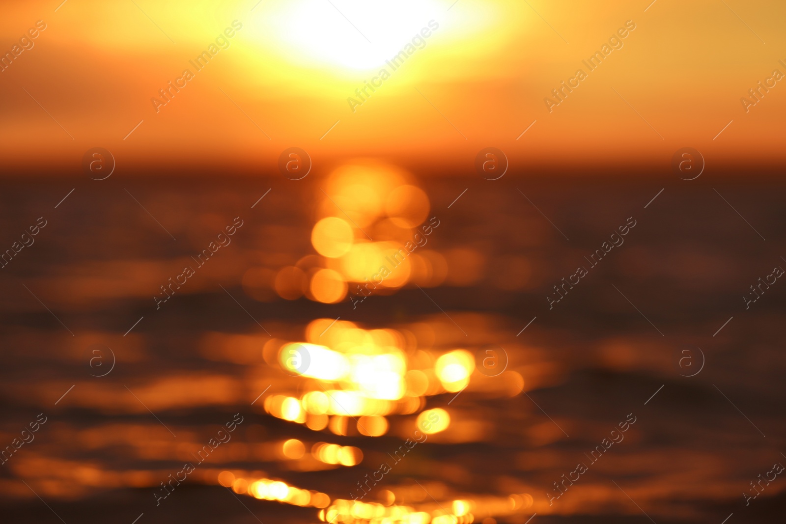 Photo of Blurred view of sea and sky at sunset