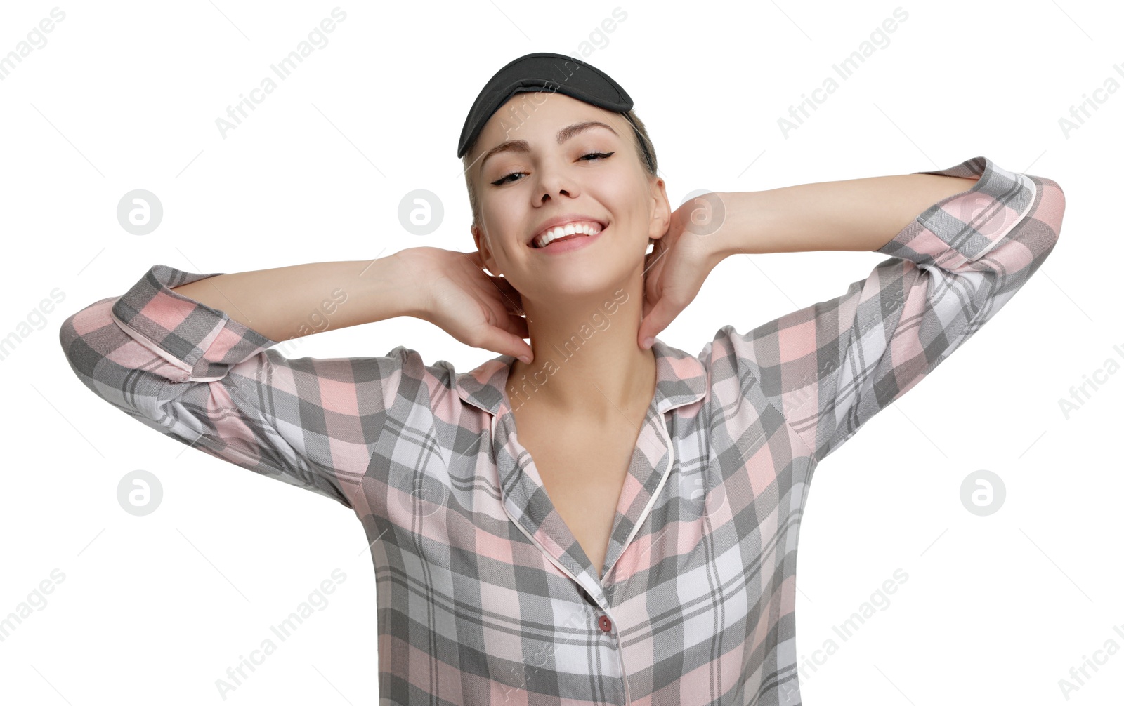 Photo of Beautiful woman wearing pajamas and sleeping mask on white background. Bedtime