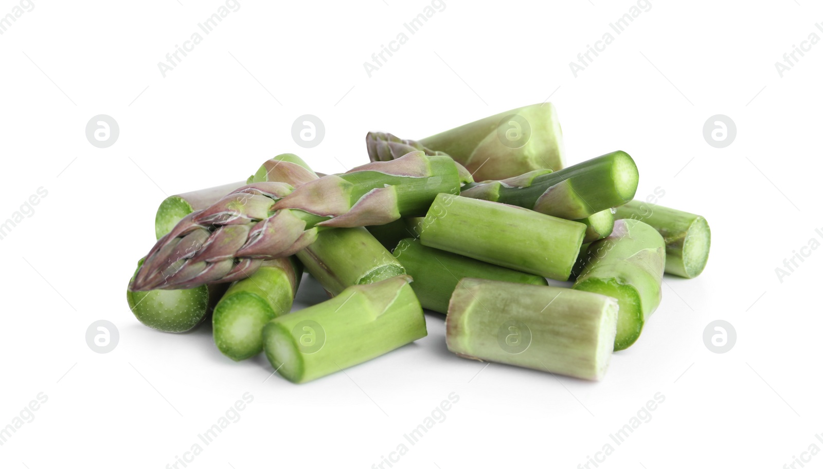 Photo of Cut asparagus isolated on white. Healthy eating