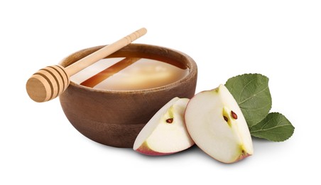 Image of Honey in bowl and cut apple isolated on white