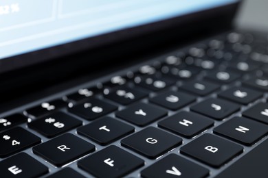 Photo of Keyboard of laptop, closeup view. Modern technology